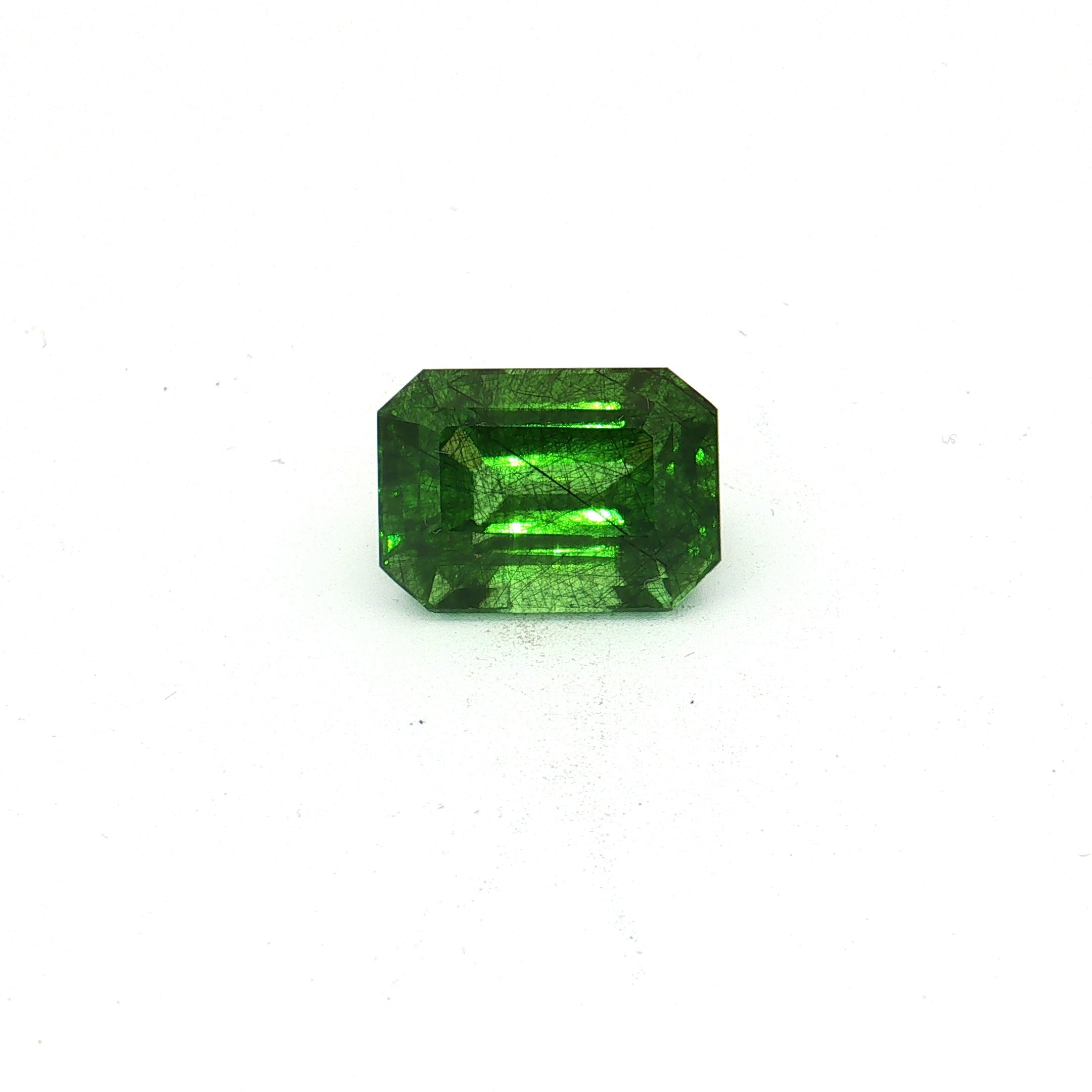 Vivid Green Peridot, 17.99 ct, Octagon · Step