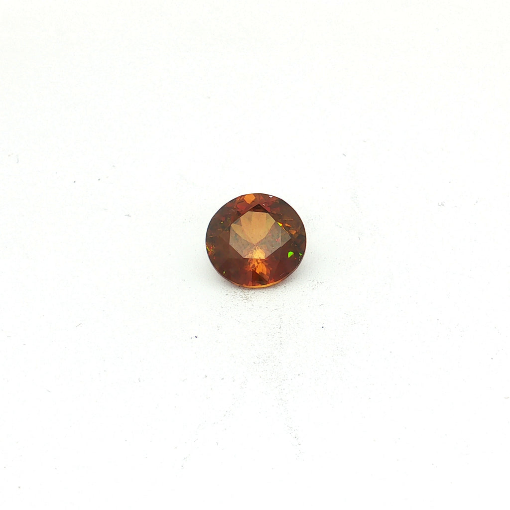 Brownish Yellow Sphene, 4.89 ct, Round · Brilliant