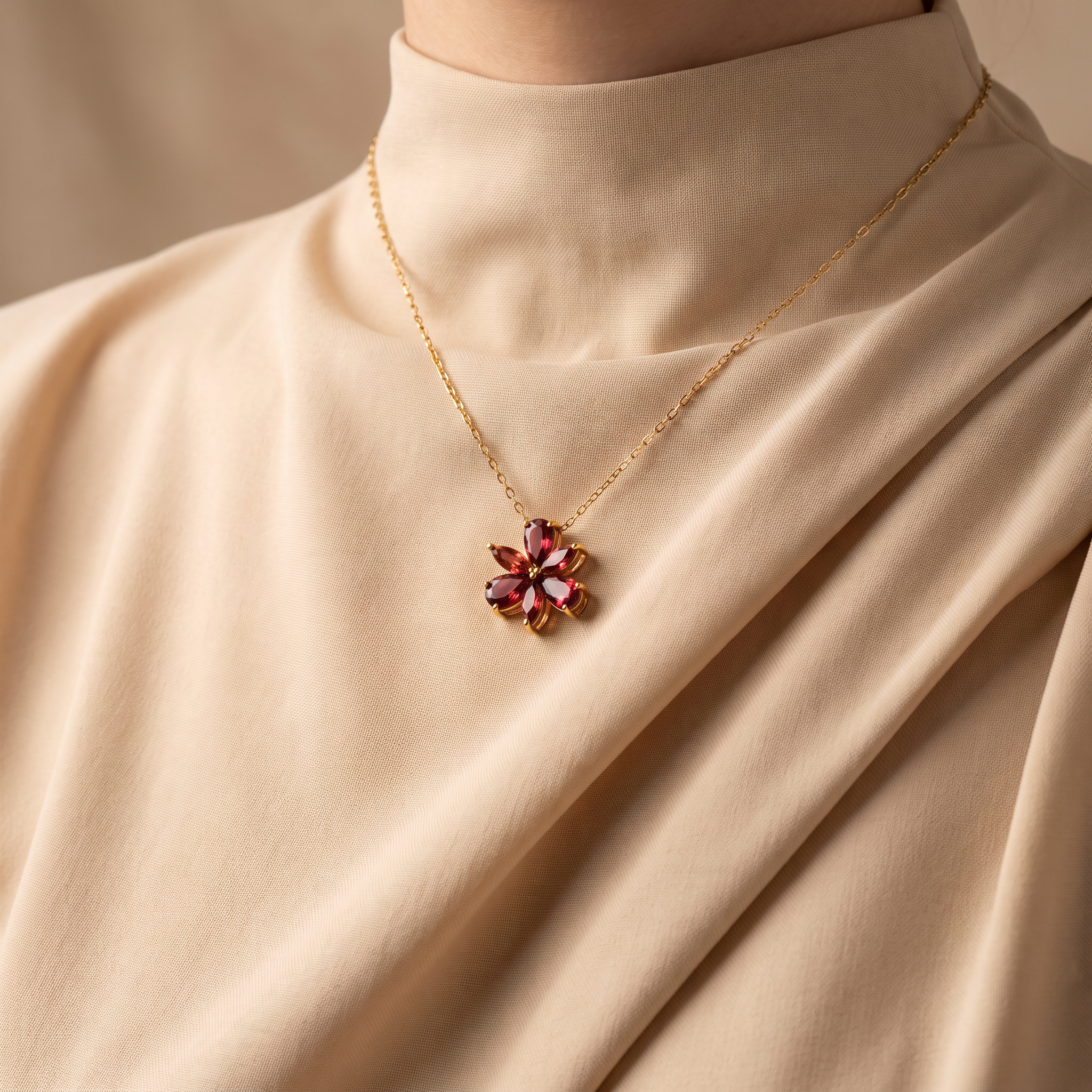Blossom Pendant · Garnet, worn
