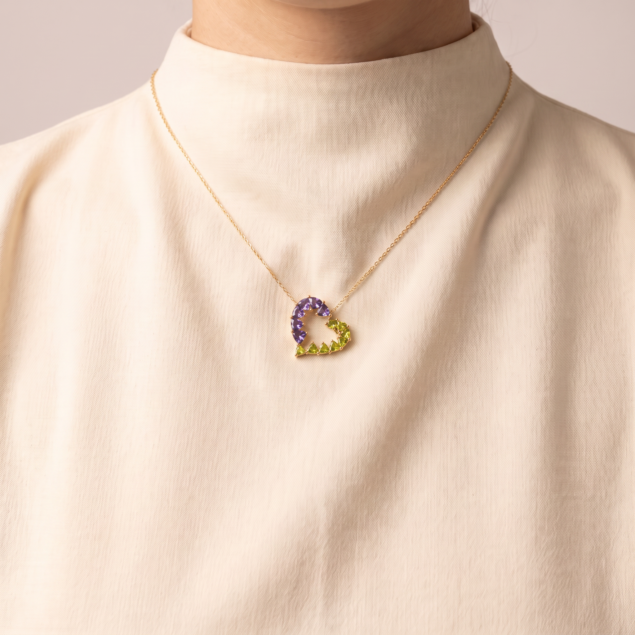 Heart Pendant · Tanzanite and Peridot, worn