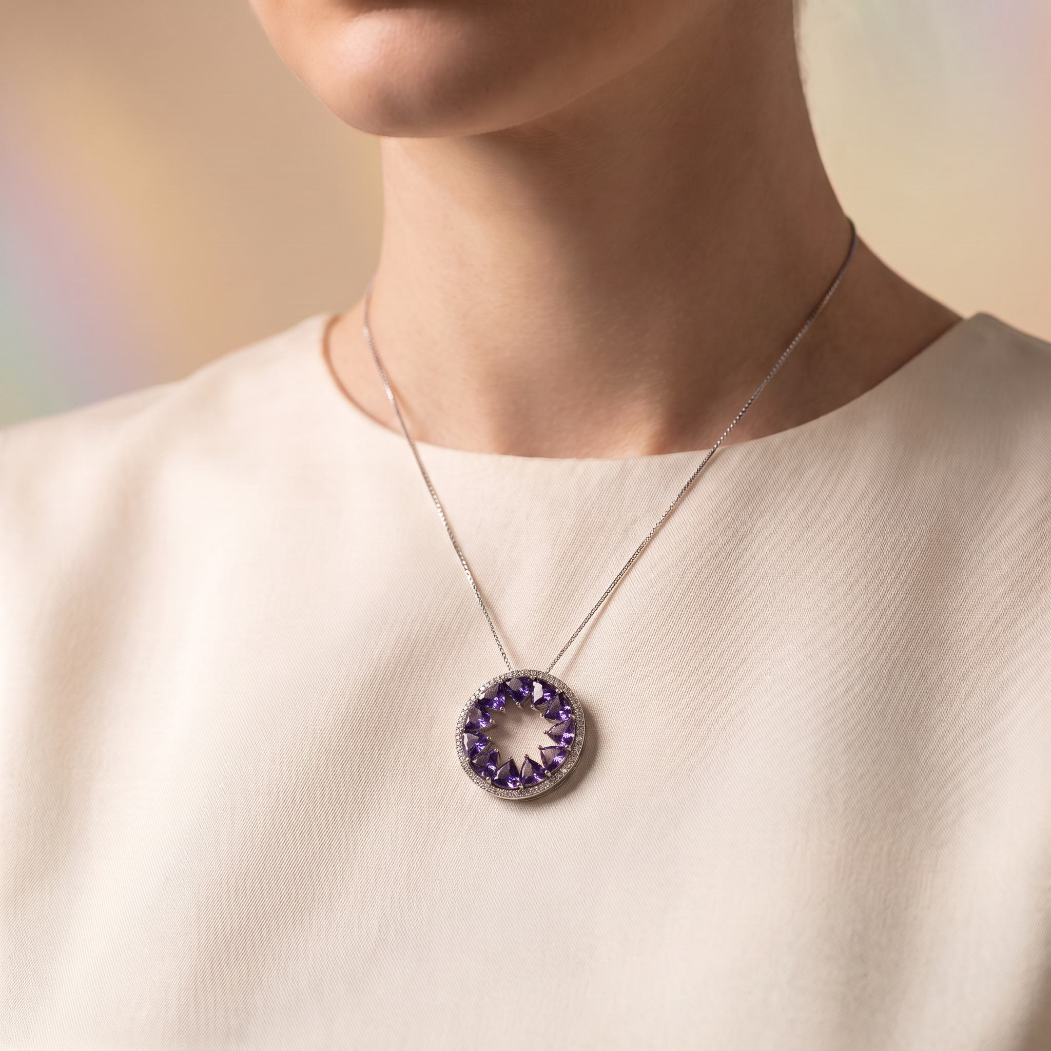 Sunburst Pendant · Tanzanite and Diamond, worn